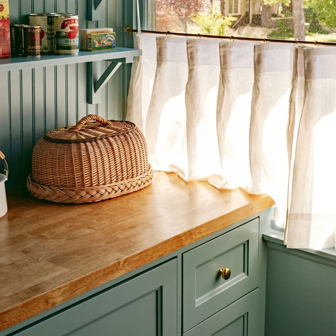 Nursery makeover with TWOPAGES Roman shades and sheer curtains